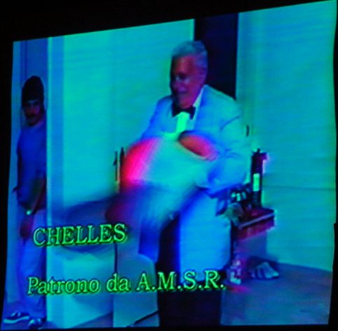 Exibi��o do v�deo da Associa��o - Imagem do Patrono Mr. Chelles